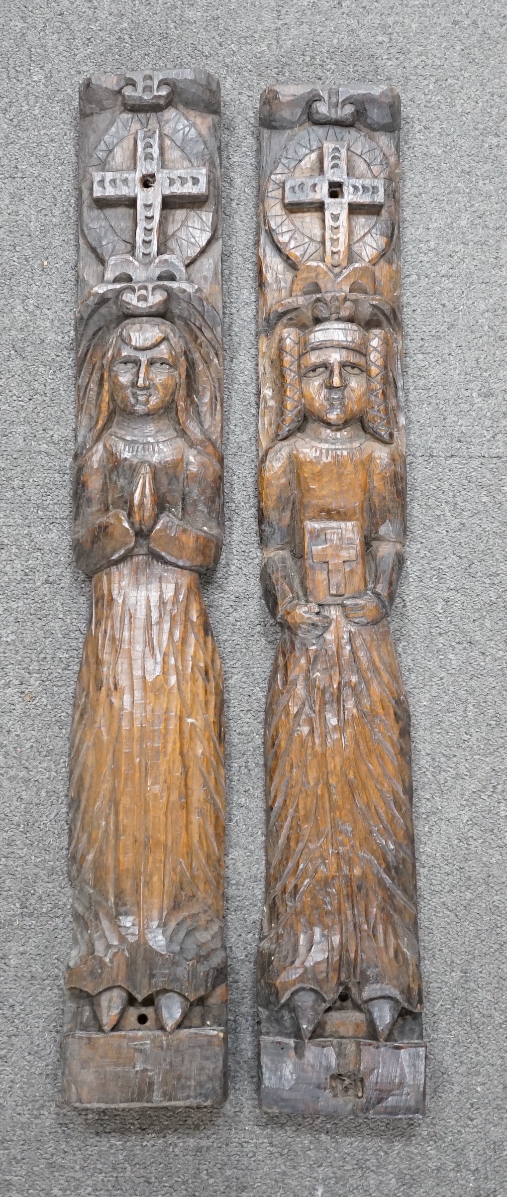 Two 19th century, oak carvings, religious figures, 67cm high